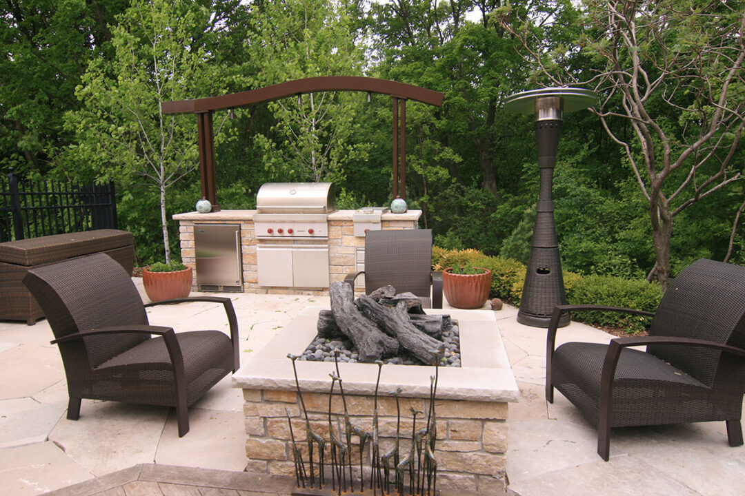 Wayzata Minnesota Custom Outdoor Kitchen and Firepit on Limestone Patio