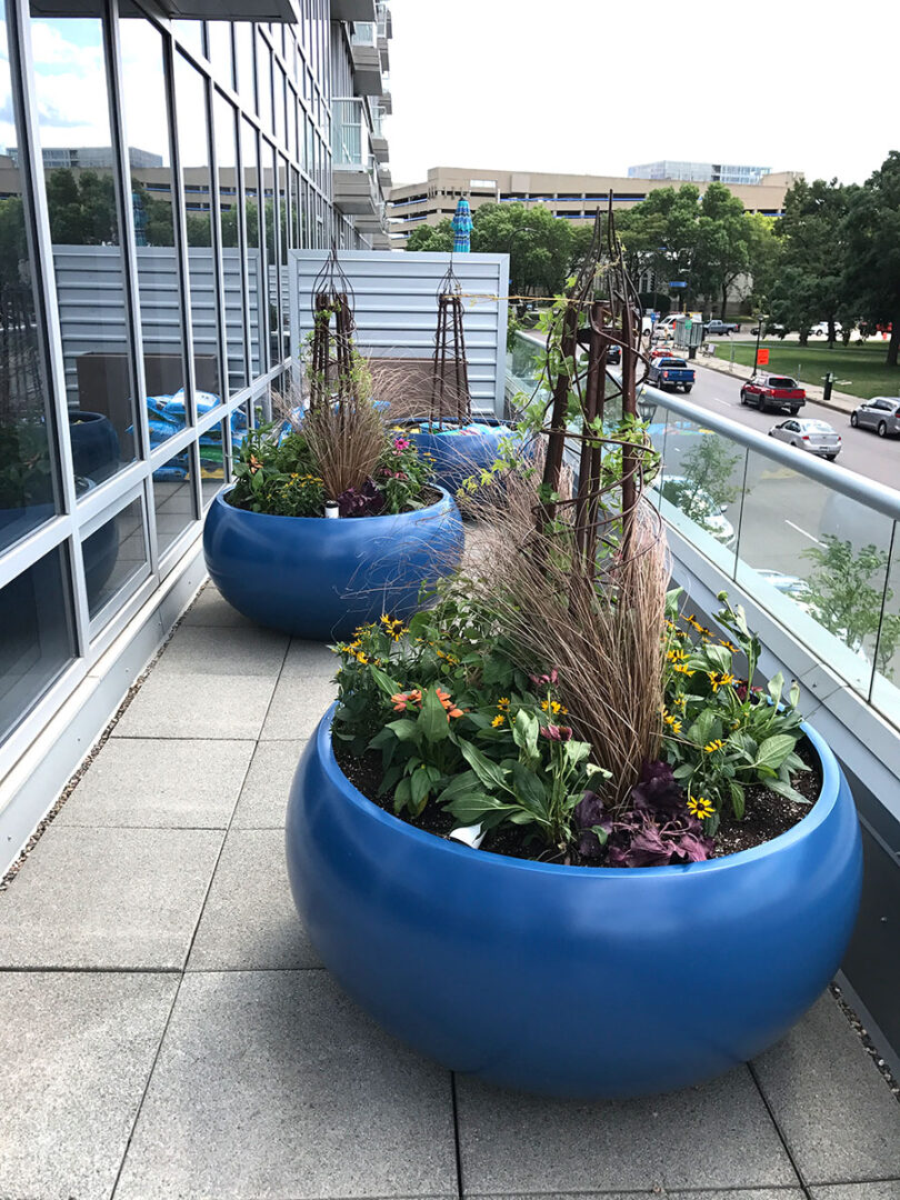 Blue-oval-planters-from-tournesol