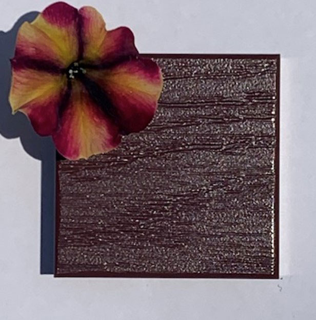 Kona woodgrain in a reddish brown color from Open Air Outdoor Cabinetry