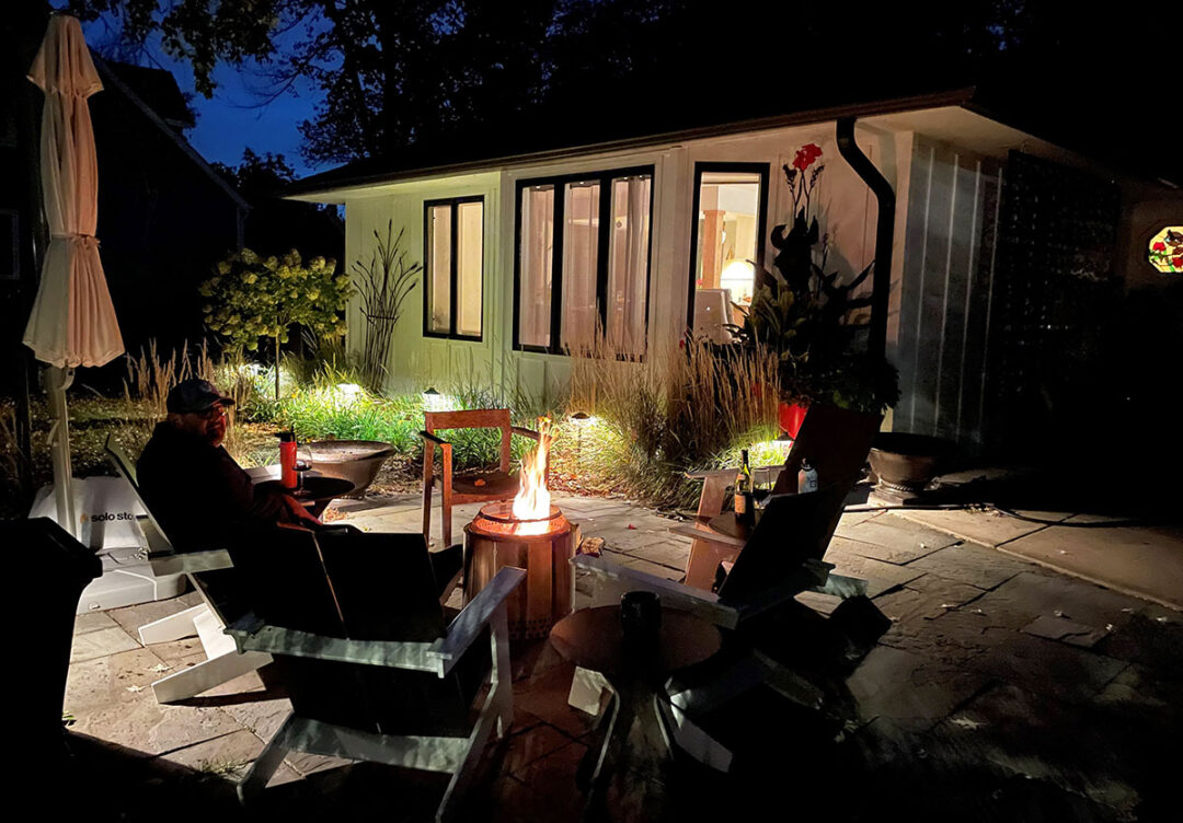Nightscape with outdoor lighting and a firepit to help with safety