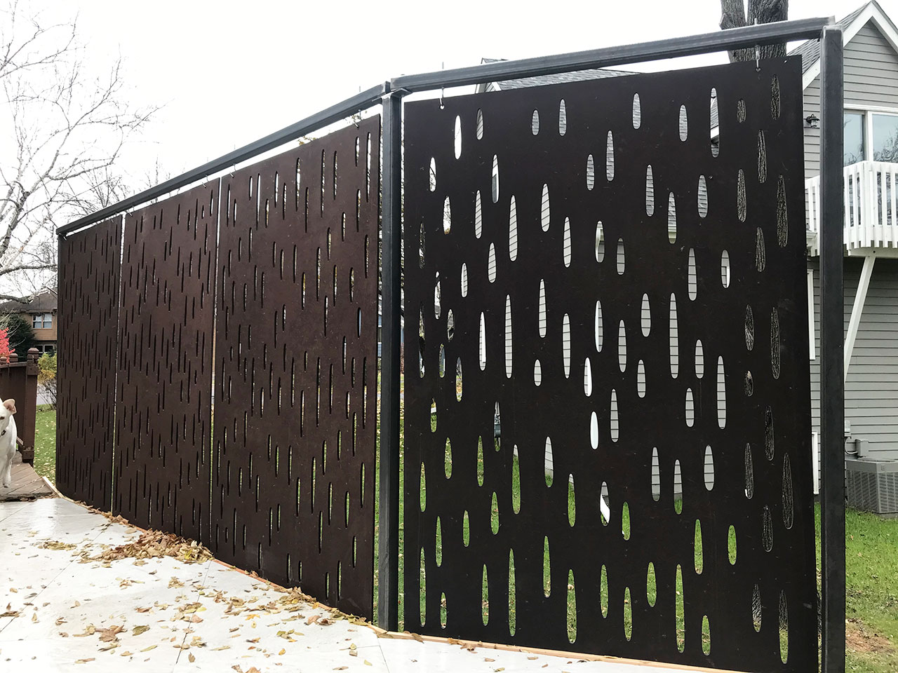OUTDECO-Monsoon-Panels-on-a-raised-patio-to-screen-from-neighbors
