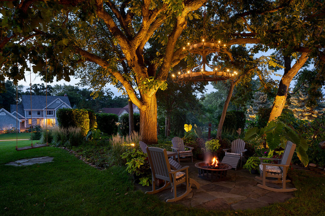 Outdoor-Lighting-in-Planting-Beds-and-Chandelier-over-Fire-Feature-and-Patio-in-Eden-Prairie,-Minnesota